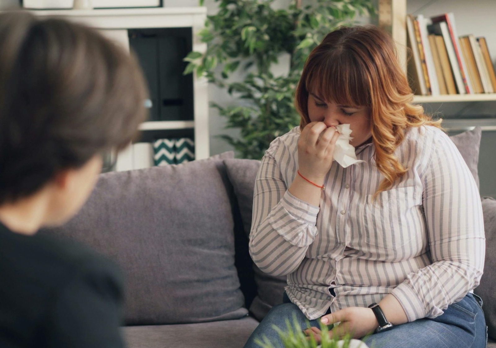 Calgary psychologist helping a female client cope with depression using ACT, CBT, and ART