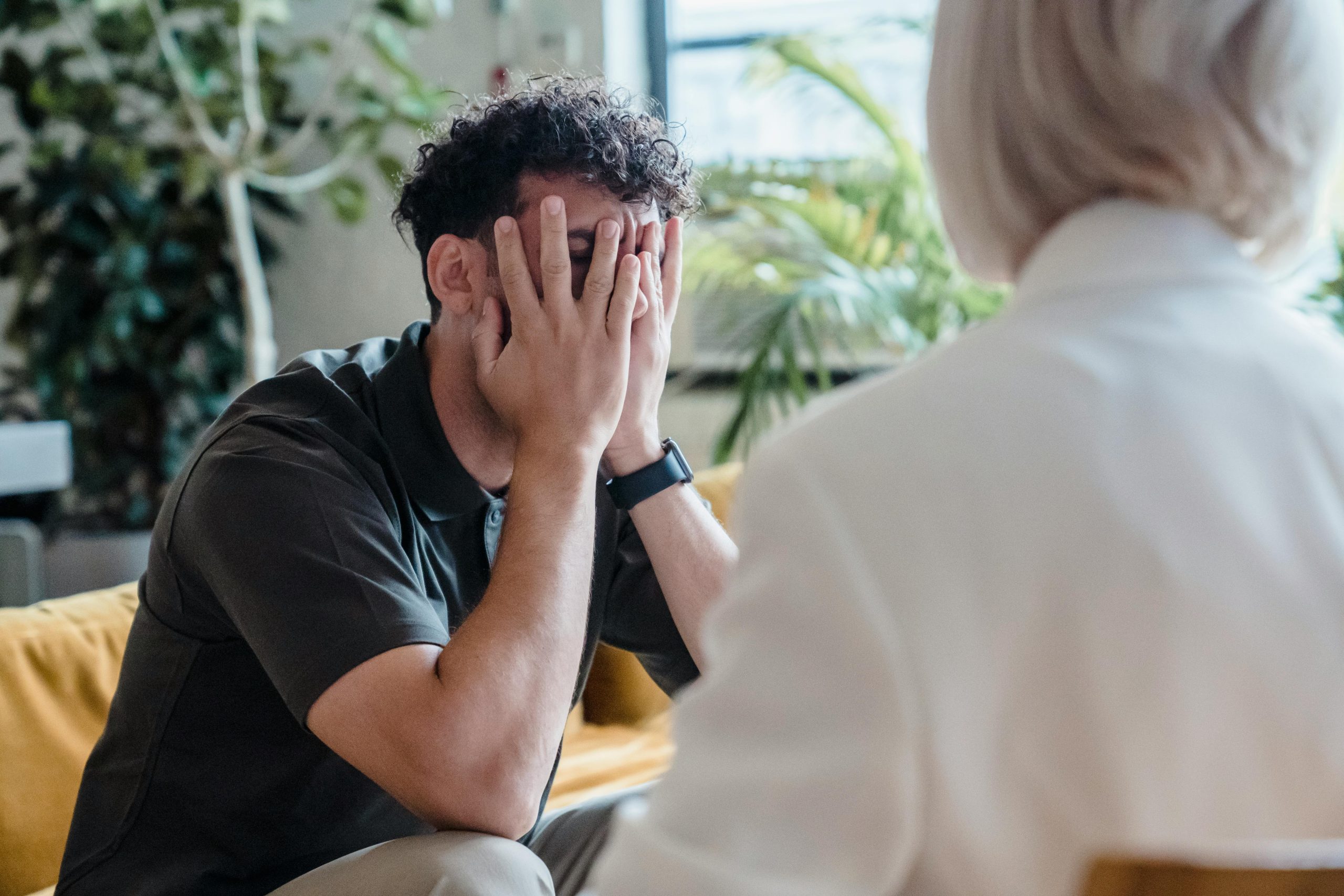 Male client discussing his mental health challenges with a Calgary psychologist