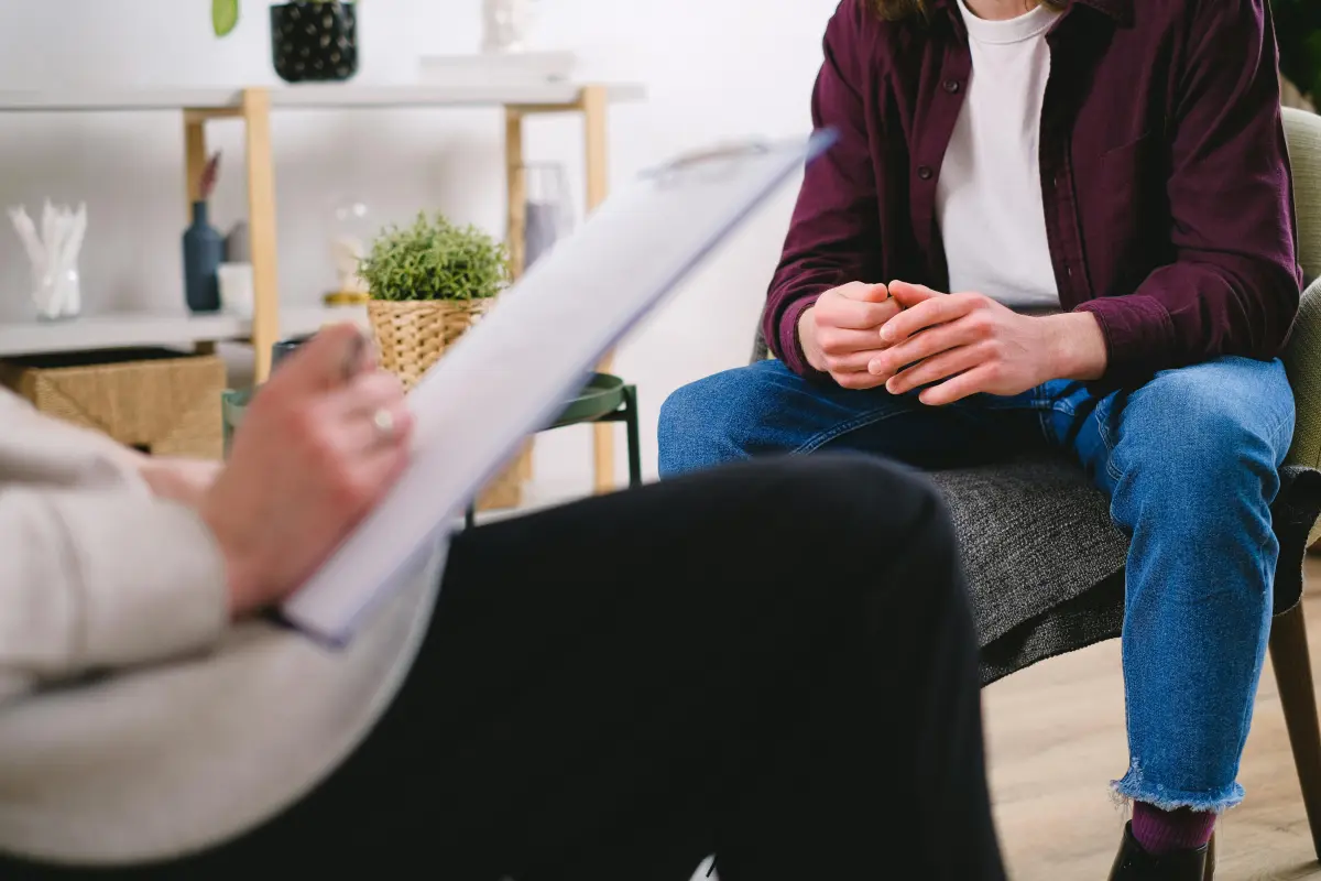 Male client learning how to manage anxiety with a Calgary psychologist, using CBT and ACT interventions.