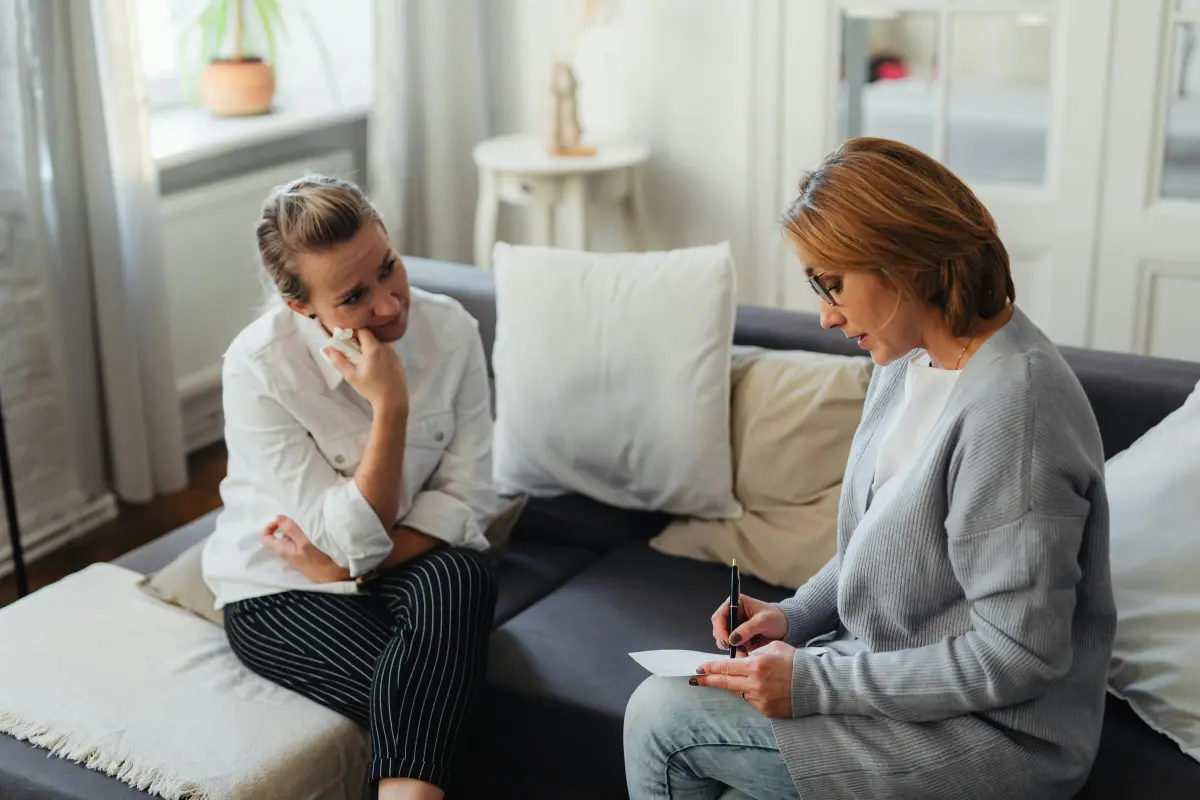 Woman engaged in grief therapy with Calgary psychologist