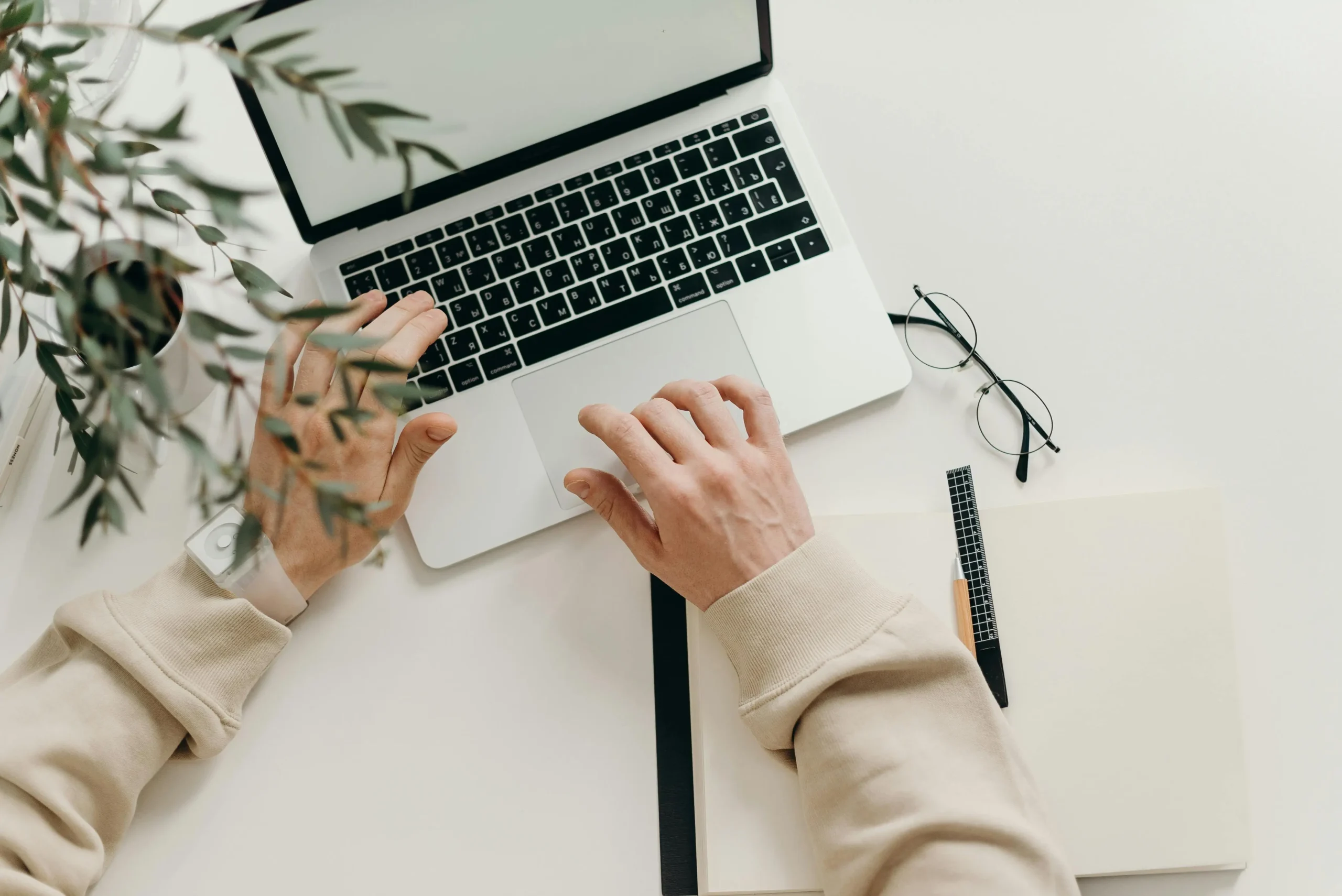 Person in a calm environment attending an online therapy session from home via secure video