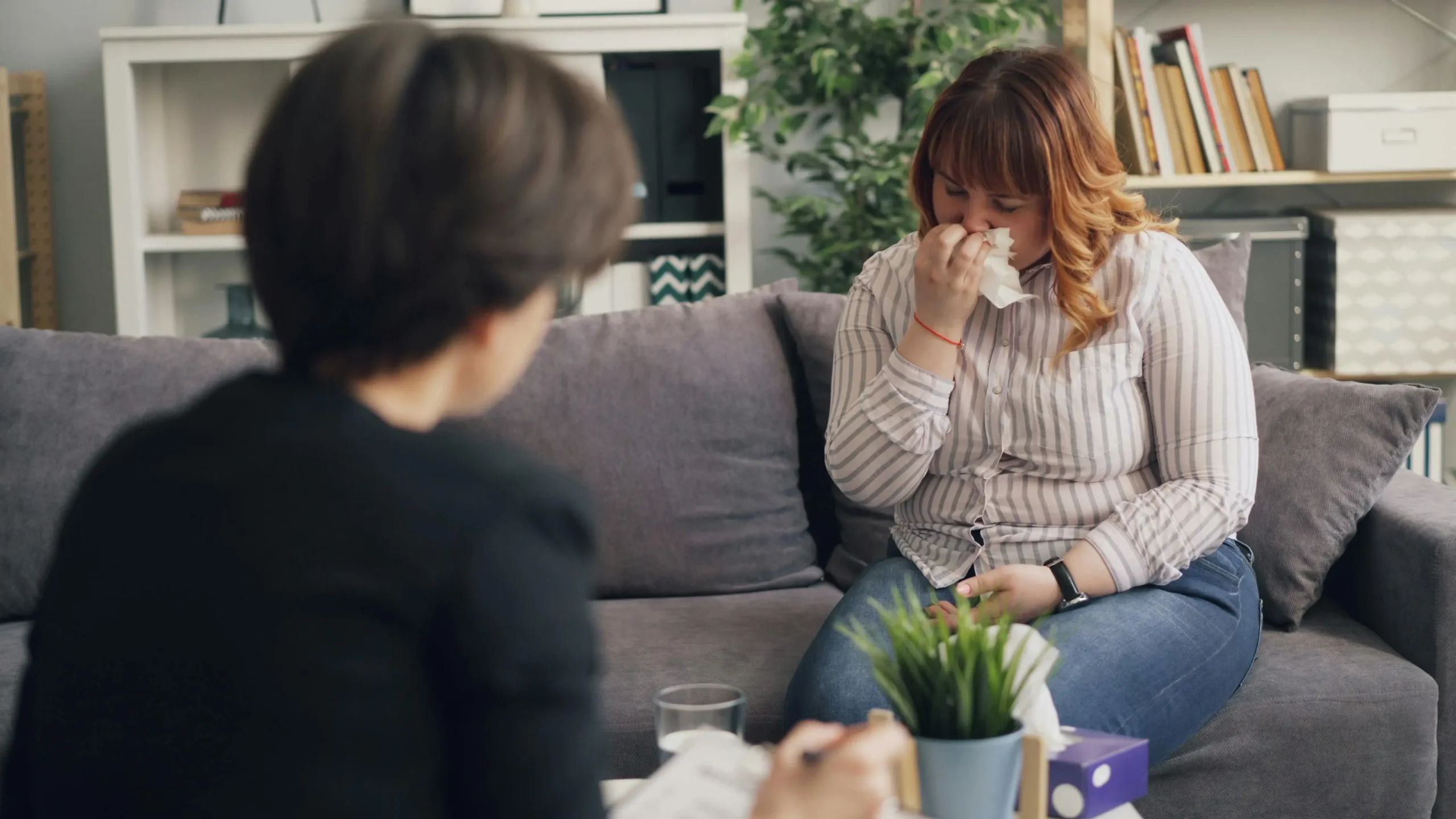 Calgary psychologist helping a female client cope with depression using ACT, CBT, and ART